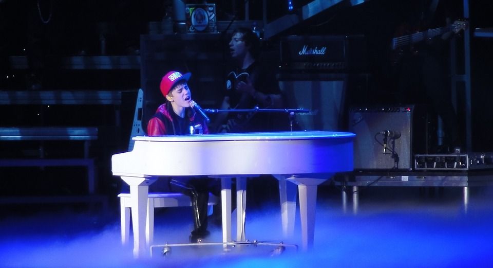 Justin Bieber Promotes His Golden Concert Shoes